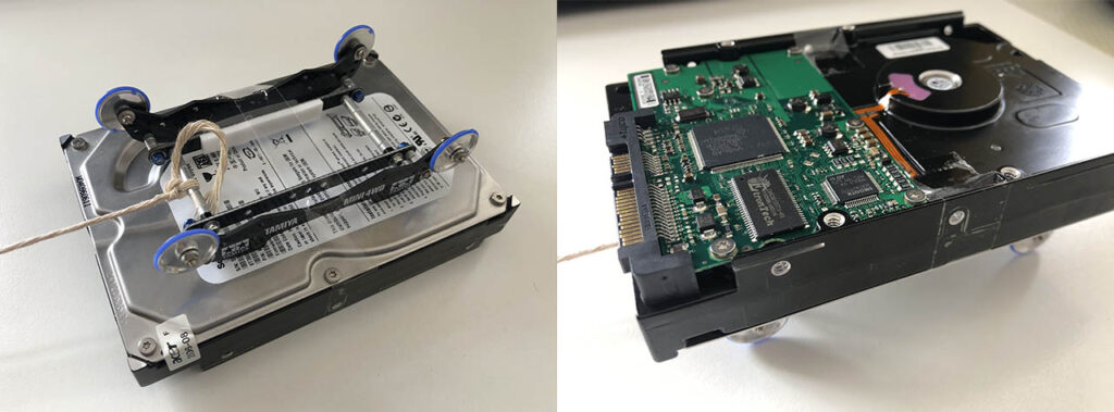 Custom made cart installed with four metal rollers mounted on a computer harddrive for Mini 4WD roller measurements